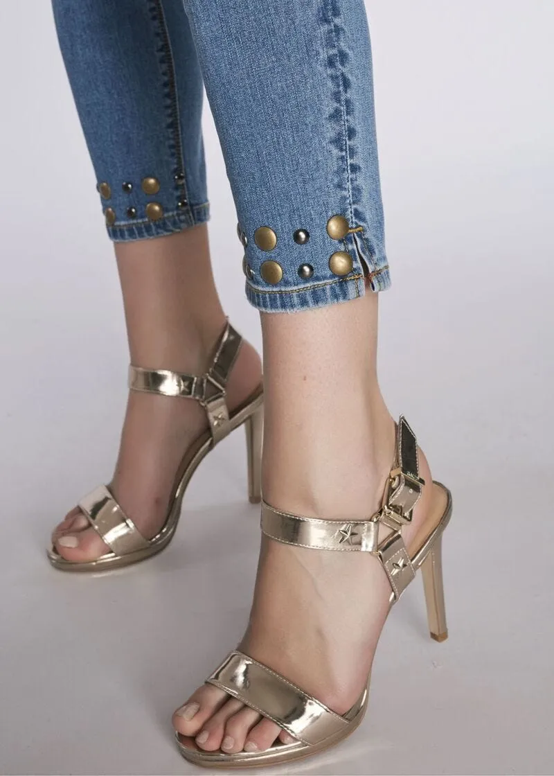Jeans capri con borchie