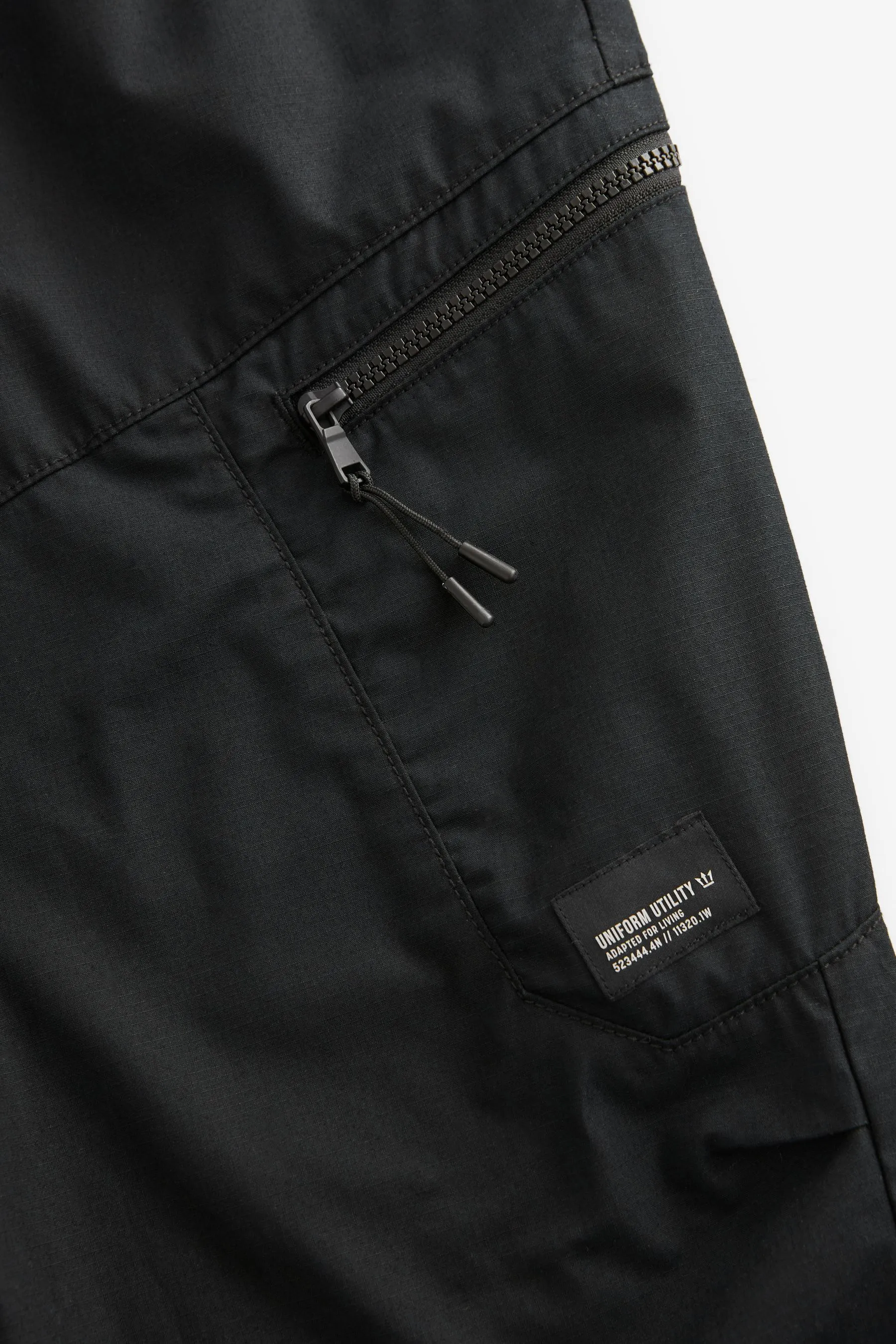 Nero  - Pantaloni cargo comoda con paracadutista