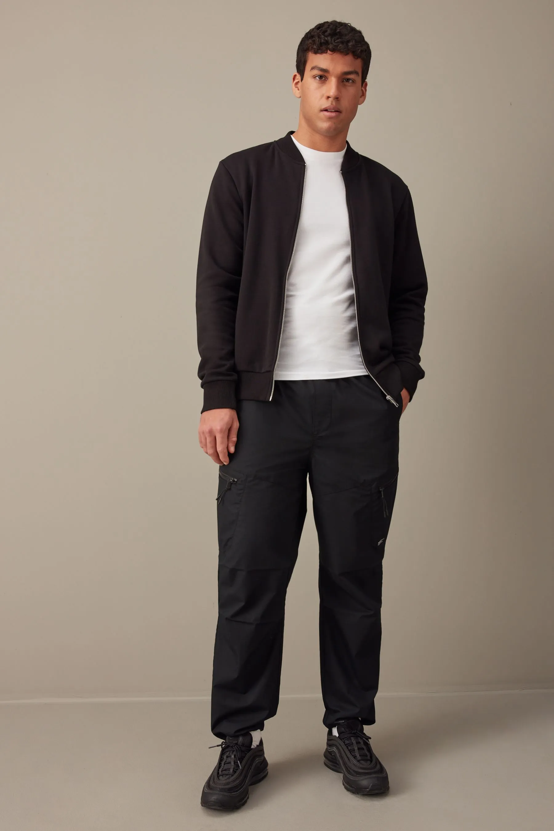 Nero  - Pantaloni cargo comoda con paracadutista