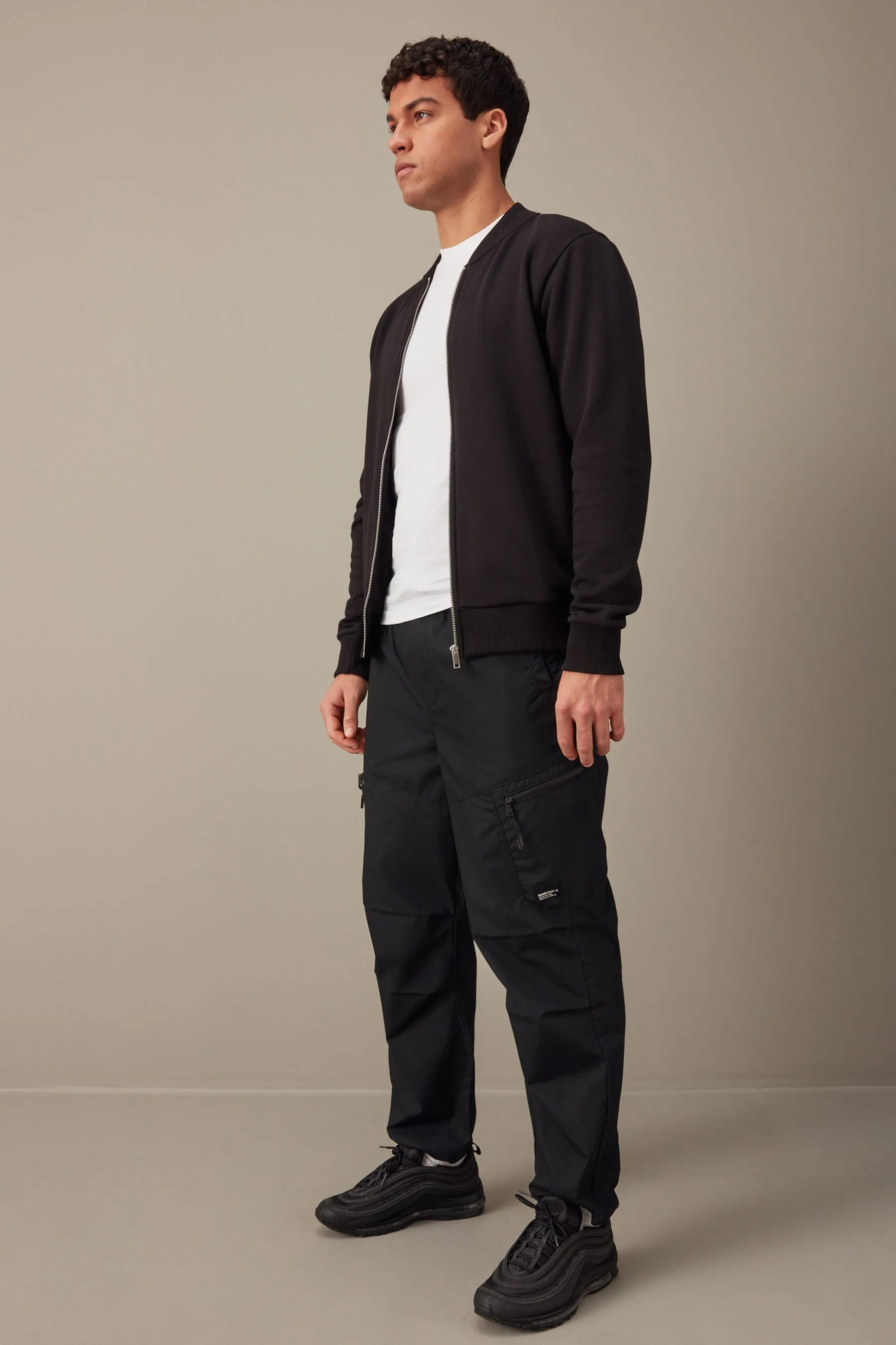 Nero  - Pantaloni cargo comoda con paracadutista