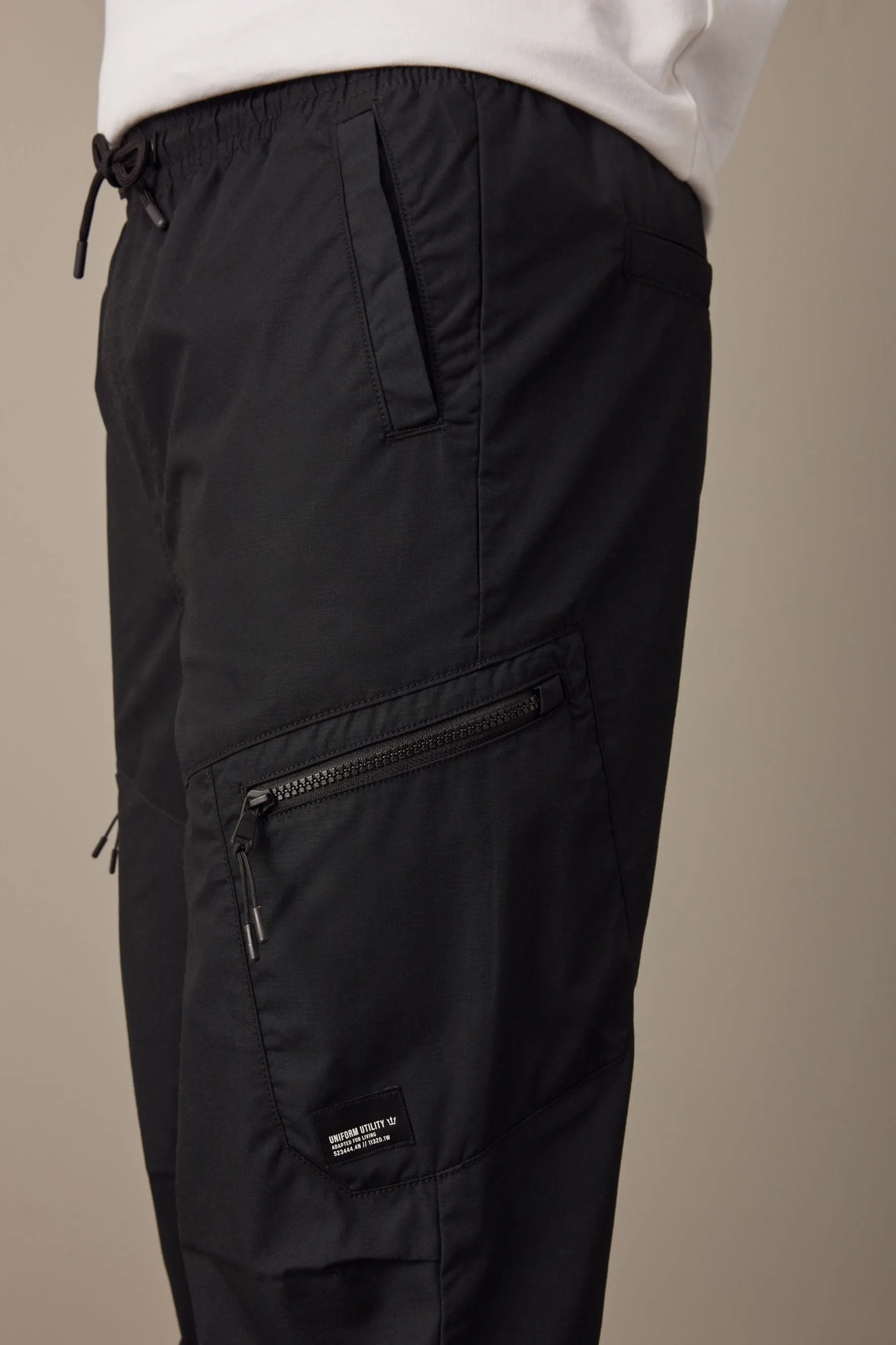 Nero  - Pantaloni cargo comoda con paracadutista