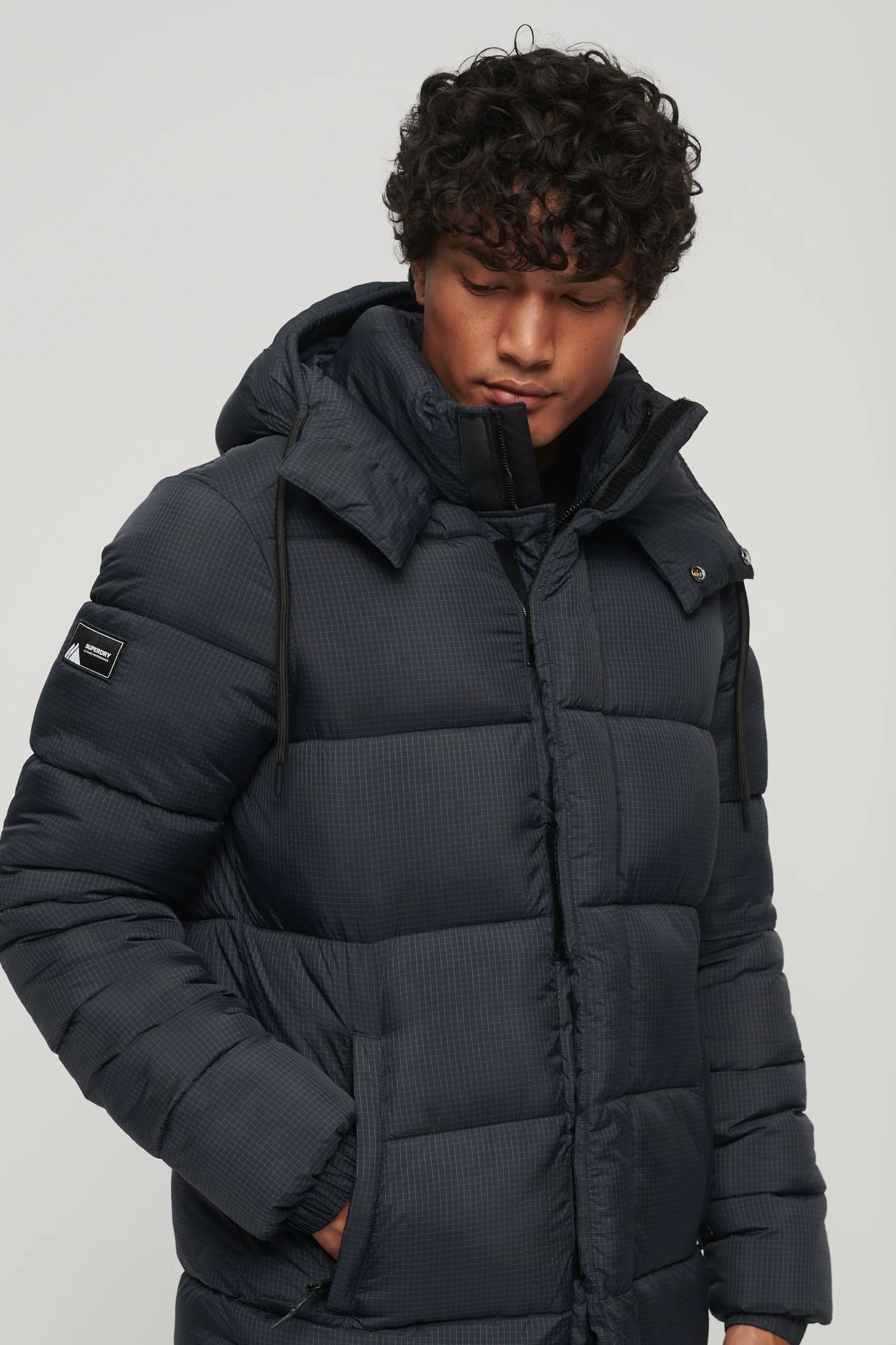 Superdry - Giacca lunga in tessuto antistrappe