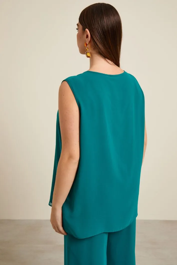 Top in georgette con spacco
