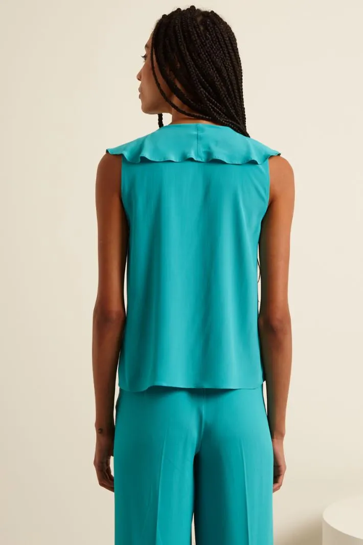 Top smanicato con rouches